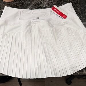 Women’s White Pleated Athletic Skirt with UPF 50+ Baleaf Sz L New W/Tags Tennis